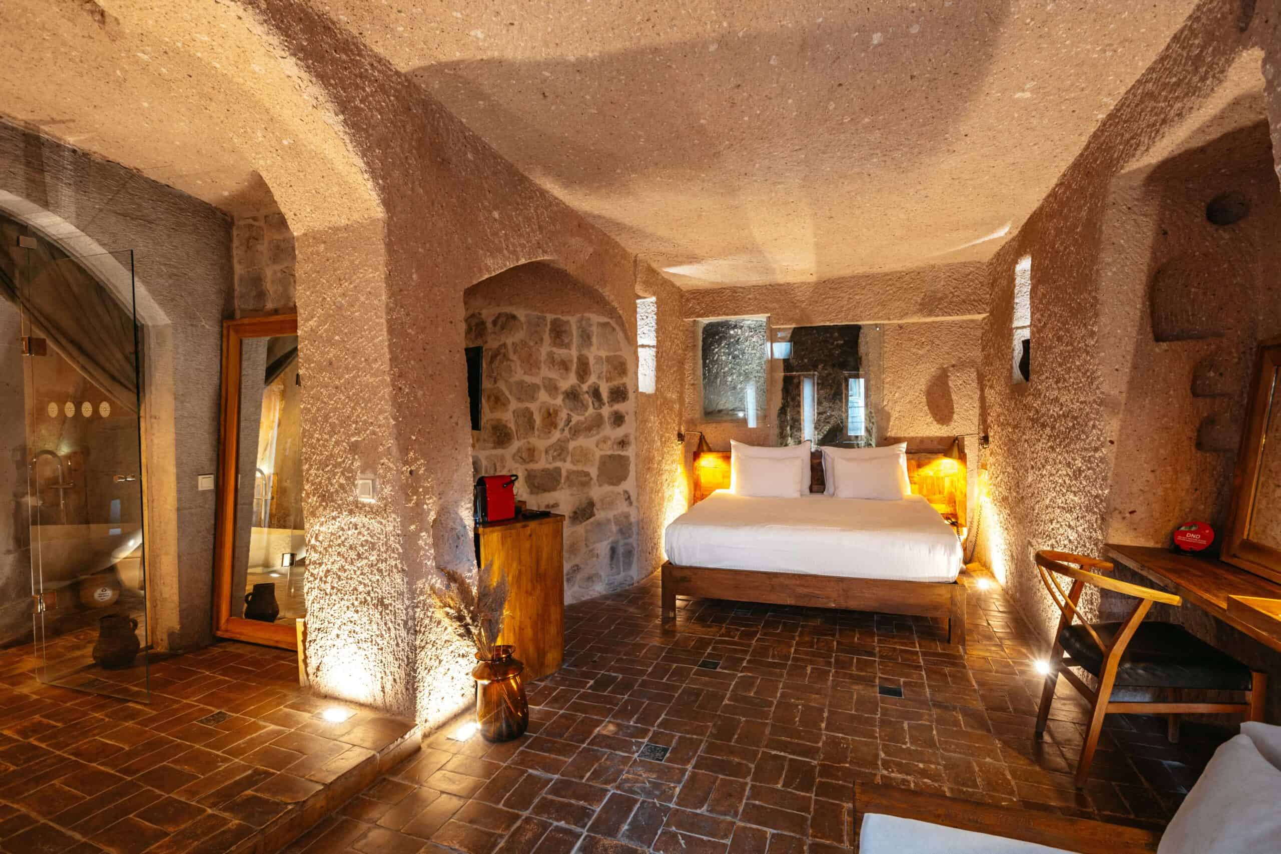 Millstone Cave Suite junior suite has a cave room with a fireplace.