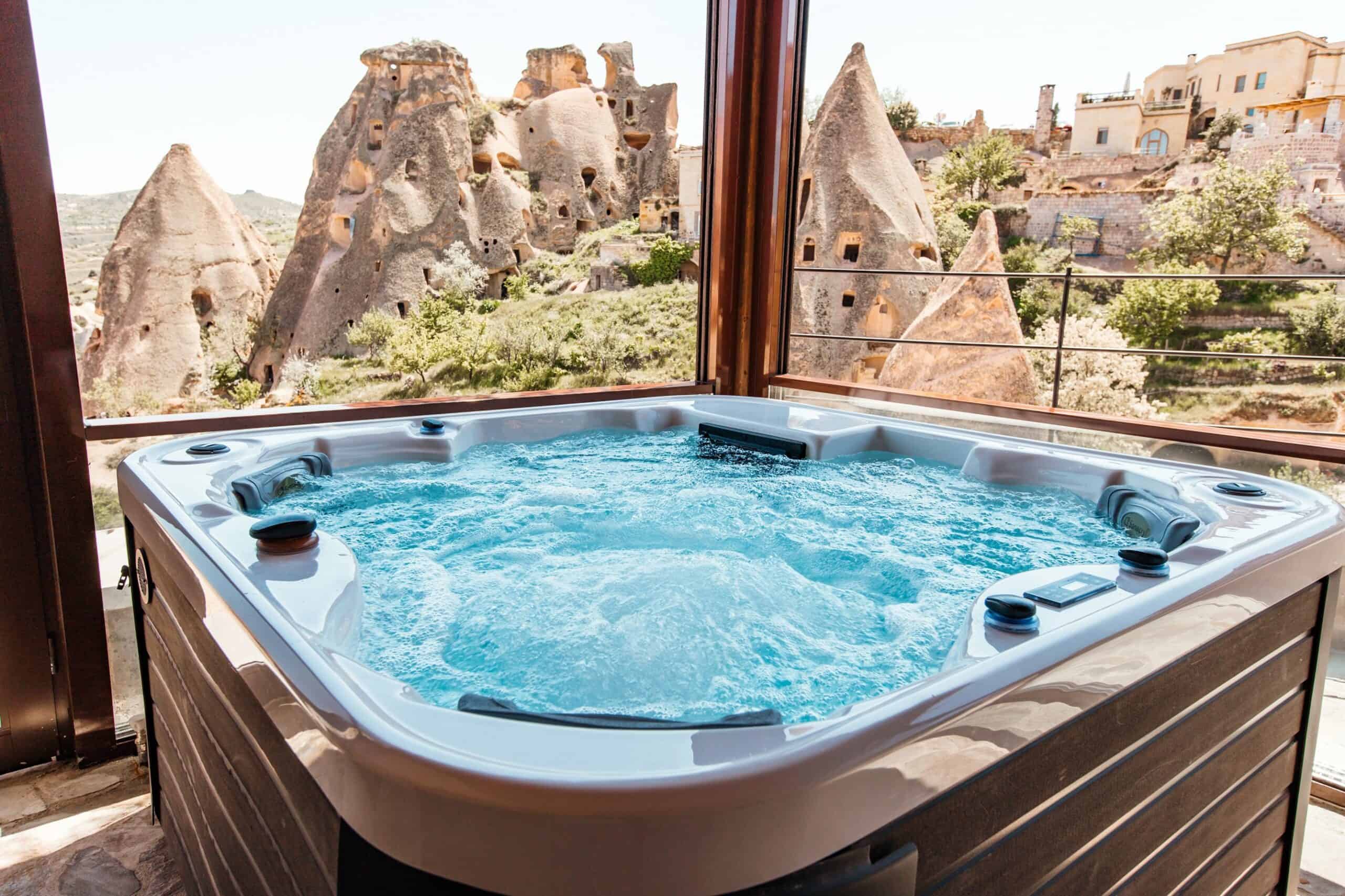 Hot tub with a view of fairy chimneys in the hot tub suite at Millstone Cave Suites.