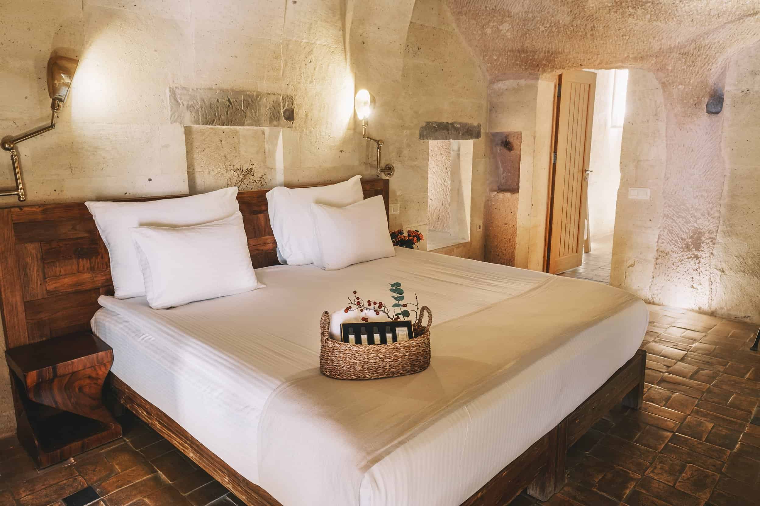 Millstone Cave Suite king suite features a cave room with a fireplace and jacuzzi.