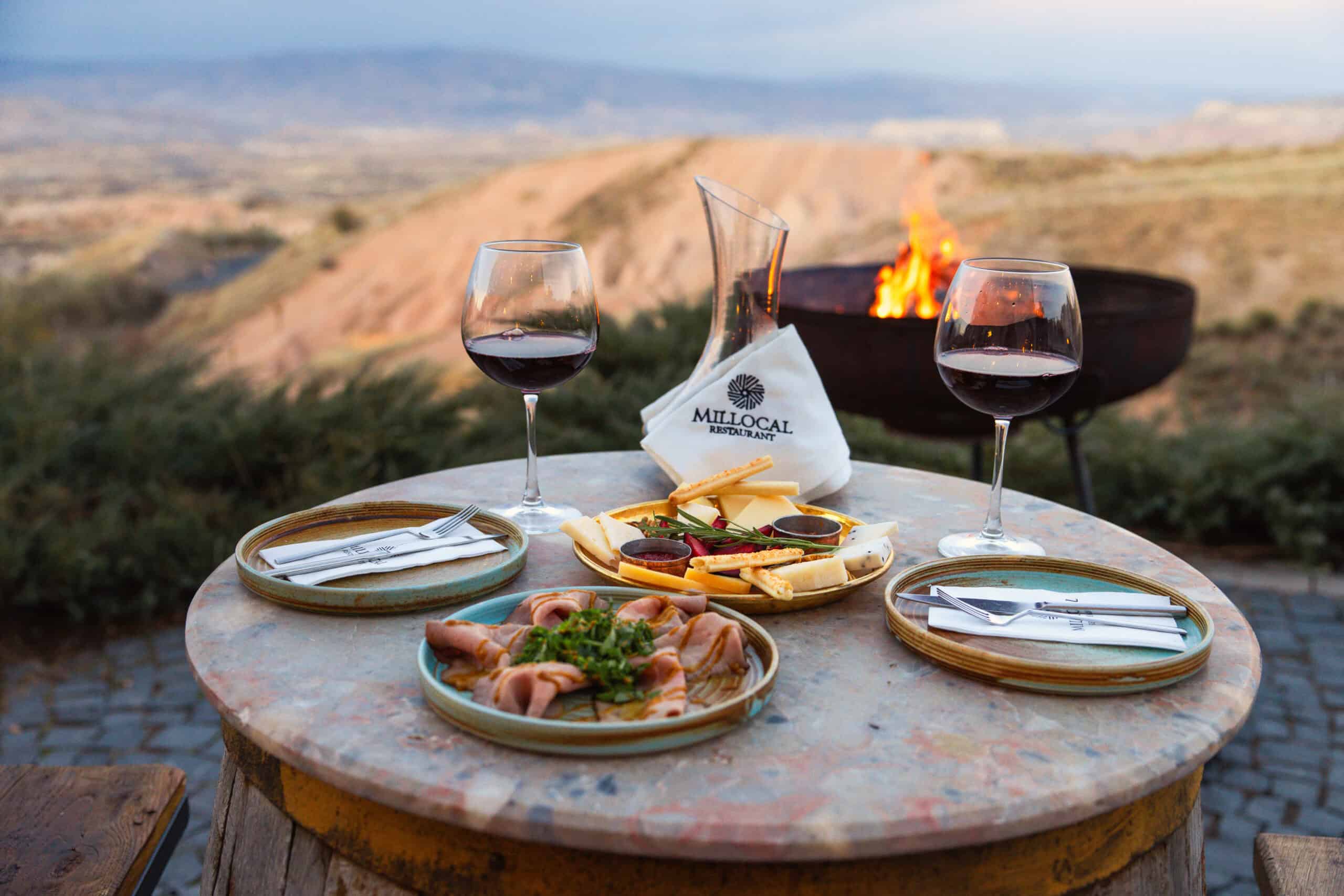 Wine tasting in the valley-view garden at Milllocal Restaurant