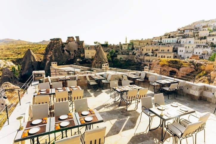 Terrace with views of Uçhisar Castle and the valley at Millstone Cave Suite's Millitaly restaurant.